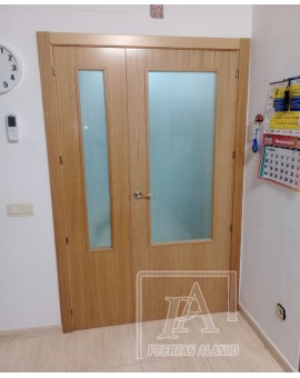 Puerta vidriera con dibujo