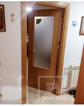 Puerta vidriera con dibujo